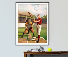 a baseball player holding a bat on top of a wooden table next to a cat