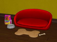 a red couch sitting on top of a hard wood floor next to a dog bone