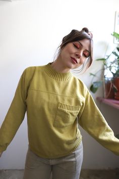 DETAILS:: // Vintage 1980s 90s chartreuse green mock neck pullover sweatshirt w/ pocket. good vintage condition, some light spots (oil?) no holes.  Chine Femme cotton poly blend  Check the measurements and model information to see if this would be a good fit for you!  Measurements are taken flat in inches and doubled at the bust, waist and hips. On some pieces I provide two sets of measurements on the bust waist and hips. First measurement is taken unstretched and the second stretched to show how much the material stretches and it's size versatility. Sleeve width is taken flat at the shoulder, measuring the width of the armholes. Please convo me if you need additional measurements!  Measurements //  Sleeve length: 20" Sleeve width: 10.5" Shoulder: 21" Bust: 42" Waist:  34" - 40" stretched Mock Neck Sweatshirt, Pullover Sweatshirts, Pullover Sweatshirt, Mock Neck, Sweat Shirt, Favorite Outfit, Two By Two, Sleeve Length, Sweatshirts Hoodie