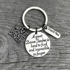 a metal keychain with a quote on it that says dance teacher is hard to find and impossible to forget