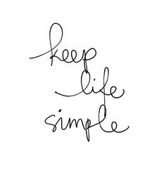 the words keep life simple are written in cursive handwriting on a white background