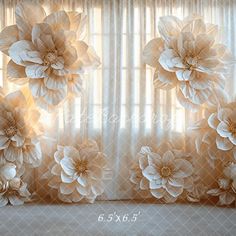 an image of flowers on the window sill with curtains in the background and sunlight coming through