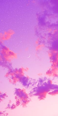 the sky is filled with pink clouds and stars