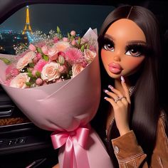 a barbie doll holding a bouquet of flowers in front of a car window with the eiffel tower in the background