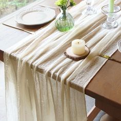 PRICES MAY VARY. Polyester [Perfect Size]: Include one ivory cheesecloth table runner, measuring 30 inches wide by 118 inches long, ideal for tables that are 3-4 feet long. [Premium Soft Material]: Made from high-quality polyester, this cheesecloth table runner is soft to the touch and durable. The sheer fabric flows gracefully, adding a romantic and elegant look to your table setup. It is wrinkle-free, fade-resistant, and reusable. [Elegant and Versatile Design]: Featuring gorgeous finished edges, this cheesecloth table runner drapes beautifully, providing a touch of vintage, rustic charm. It's perfect for enhancing the aesthetics of various events, from weddings and bridal showers to baby showers and Thanksgiving dinners. [Wide Range of Applications]: Suitable for multiple occasions, inc Table Runners Sheer, Sheer Table Runner Wedding, Cream Table Runner, Thanksgiving Dinners, Cheesecloth Table Runner, Flowers Board, First Communion Decorations, Communion Decorations, Kids Baskets