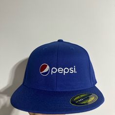 Blue Pepsi-Cola Hat Blue Flat Bill Hats For Spring, Fitted Blue Cap, Blue Adjustable Visor Fitted Hat, Adjustable Blue Fitted Hat With Visor, Adjustable Blue Visor Fitted Hat, Blue Flat Brim Baseball Cap For Beach, Blue Flat Bill Beach Hat, Blue Flat Bill Hat For Beach, Pepsi Blue