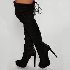 Step up your style with these black platform lace-up thigh-high boots. Featuring a lace-up design, platform sole, and thigh-high length, these boots are perfect for making a bold fashion statement. Color: Black Heel Type: Stiletto heel Heel height: 5.9" / 150 mm approx Product measurements were taken using size 8. Please note that measurements may vary by size. Toe: Almond toe Back hollow-out and lace-up design Handcrafted US sizing. Fits true to size. Black Knee-high Boots With Front Lace-up Fastening, Fall Lace-up Platform Boots For Night Out, Lace-up Platform Boots For Night Out In Fall, Lace-up Platform Boots For Fall Nights, Black Lace-up Boots For Party, Party Platform Knee-high Lace-up Boots, Party Knee-high Lace-up Platform Boots, Black Lace-up Platform Knee-high Boots, Thigh High Platform Heeled Boots For Night Out