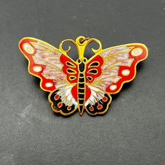 Vintage red enamel butterfly brooch / pendant. Approximately 1.8 inches across. Very good vintage condition. Red, black, and marbled pinky white enamel. Probably Chinese enamel. Lovely Christmas, Holiday, Mother's Day, Easter, Birthday gift for that special someone. Contact me for combined shipping or a Canada Post rate. Red Enamel Brooch Pin For Gift, Red Vintage Lapel Pin As Gift, Vintage Red Lapel Pin As Gift, Red Vintage Lapel Pin For Gift, Vintage Red Lapel Pin For Gift, Red Enamel Brooch, Red Enamel Brooch Pin, Red Enamel Brooch Gift, Red Enamel Brooches As Gift