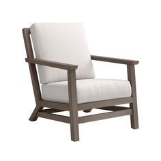 a wooden chair with white cushions on it's back legs and armrests