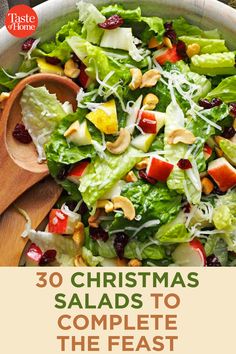 a salad with lettuce, cranberries and nuts in it