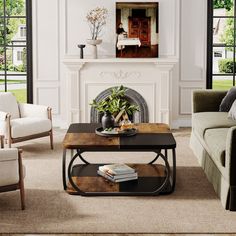 a living room with two couches and a coffee table in front of a fireplace