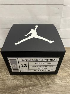 a black box with a white jordan logo on it