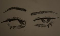 the eyes are drawn in pencil on paper