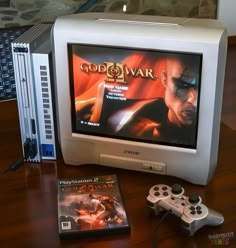 a video game system sitting on top of a wooden table