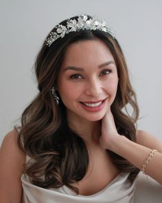 Juliet's delicate shimmering branches & ivory metal leaves make this flower crown one that will sparkle long after your wedding day. Hand crafted with metal leaves, genuine crystal beads & gemstones. Measures 1.5 inches at the center peak. Lightweight & easy to style. Style #3283 Bride photo credit: Bride - Brittany, Photo - Aimee Nguyen Photography Tiara Floral, Bridal Floral Headpiece, Floral Tiara, Pearl Hair Vine, Tiara Wedding, Crown Bridal, Crown Wedding, Bridal Hair Clip, Wedding Hair Clips