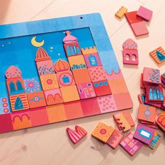 colorful wooden toys and magnets on a table