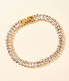 "Sahira Jewelry Design Shayna Baguette Bracelet - Gold , Women's Gold Cubic Zirconia 18k gold plated stainless steel bracelet Water and tarnish resistant Length measures 6 1/2". Apparel & Accessories" Baguette Bracelet, Stainless Steel Bracelet, Womens Jewelry Bracelets, Womens Bracelets, Apparel Accessories, Cubic Zirconia, Gold Bracelet, 18k Gold, Buckle