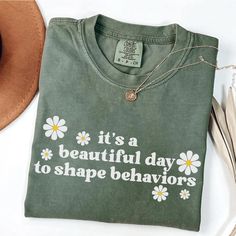 a t - shirt that says it's a beautiful day to shape behaviors