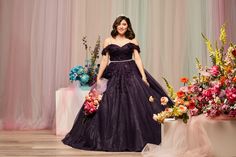 This sparkling tulle quinceanera ball gown is covered in dimensional floral appliques and features detachable swag sleeves that let you change up your look throughout the night. | #ballgown #quinceanera #beautifulgirl | Style FR2111 | Shop this style and more at davidsbridal.com