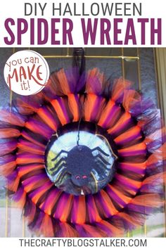 a spider wreath with the words, diy halloween spider wreath you can make it