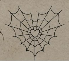 a spider web with a heart drawn on it's center and the word love written below