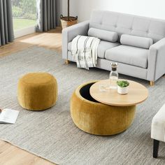 PRICES MAY VARY. 100% Polyester Elegant Design: The Round Coffee Table Set features an 1pc big storage ottoman with removable small stool and wood table top design that is space saving and practical functional as well as selevate its artistic appeal. Big Storage Space: This storage ottoman not only gives you stylish appearance, it also can keep your home tidy as a toy box,helping keep your room organized and clean, and work as a coffee table to accompany you at night, provide a cozy rest for your tired feet, offer an extra stool for your friends. Mutifunctional Ottoman Set: Decorate your home with this upholstered storage ottoman. It can be used as an coffee table, ottoman, footstool or playing table. Upholstered in sumptuous fabric, its multiple color options make it the perfect accent pi Ottoman Styling Living Room, Yellow Coffee Table, Styling Living Room, Storage Ottoman Coffee Table, Round Coffee Table Sets, Fabric Storage Ottoman, Round Storage Ottoman, Drum Coffee Table, Ottoman Styling