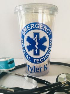 "Show your pride as a EMT with our 16oz insulated acrylic tumbler. This tumbler is a perfect travel cup and easily fits in any cup holder. This cup will make a great gift to congratulate a new EMT and is completely personalized with his/her name under the emblem. Each clear tumbler comes complete with a reusable straw.  High quality commercial grade adhesive vinyl is applied this 16oz BPA-Free double walled tumbler.  Washing Instructions: Hand wash only, not recommended for the dishwasher. Ordering Instructions: At checkout in \" Notes To Seller\", please tell us the \"name\" we will use to personalize this tumbler. Please NO first and last names for lack of room to accommodate both." Ems Week, Pr Ideas, Vet Technician, Clear Tumbler, Emt Gift, Craft Boutique, 1st Responders, Emergency Medical Technician, Medical Technician