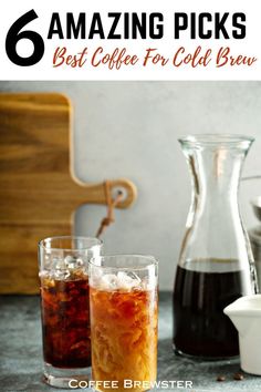 two glasses filled with cold drinks sitting on top of a counter next to a pitcher