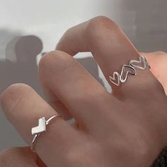 Newadorable!! 2 Piece Adjustable Hollow Heart Ring Set In Silver Plating. The Rings Ate Adjustable And Will Fit Most Fingers. Both The Inner Heart Ring And Hollow Heart Ring Is Included. Very Unique And Different. Makes A Perfect Gift Or For Yourself. Suitable For All Teens. Suitable For All Occasions. Rings Simple Silver, Daily Rings, Korean Rings, Trendy Rings, Index Finger Rings, Rings Style, Heart Butterfly, Couples Ring Set, Hollow Heart