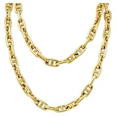 Necklace is comprised of substantial and stylized mariner links Puffed with a brightly polished finish Completed by a concealed clasp that opens on a hinge With a figure eight safety Italian assay marks for 18 karat gold and Vicenza, Italy Inscribed 'Made Italy' and signed Bvlgari Circa: 20th Century Length is 72cms Total weight 105g Art Deco Pendant Necklace, Vintage Chain Necklace, Bulgari Jewelry, Vicenza Italy, 18k Gold Necklace, Art Deco Pendant, Heart Brooch, Link Chain Necklace, Authentic Italian