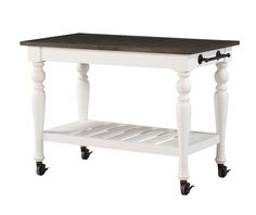 a white and black table with wheels on the bottom, two shelves below it for storage