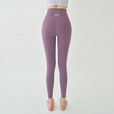 18% spadex/ 82% Polyethylene Model is 5'6" and wearing purple small. Purple Sporty Leggings For Pilates, Purple High Stretch Sporty Leggings, Sporty Purple Leggings For Pilates, Sporty Purple Tights For Pilates, Purple Compression Leggings For Yoga, Micro-elastic Purple Activewear For Workout, Purple Micro-elastic Activewear For Workout, Purple Compression Tights For Yoga, Purple Compression Yoga Leggings