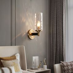 a living room scene with focus on the wall light