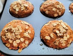 muffins with oats are sitting in a pan