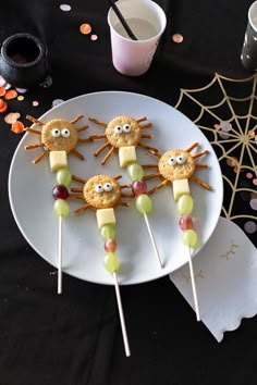 some food is on a white plate with candy and sprinkles in the shape of eyes