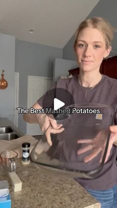 a woman holding up a glass pan in her kitchen with the words, the best method potatoes