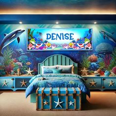 a bedroom decorated in blue and green with dolphins on the wall