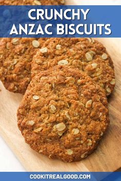 three cookies on a cutting board with text overlay that reads crunchy anzac biscuits