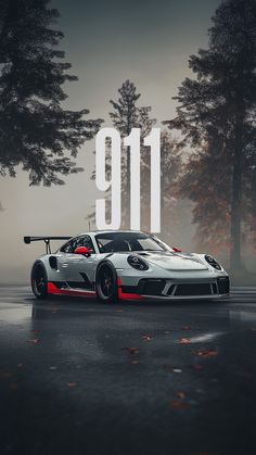 a sports car with the number ten on it's side in front of some trees