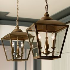 two light fixtures hanging from the ceiling