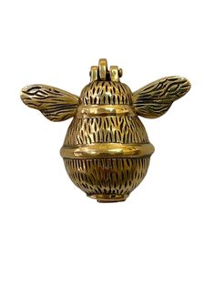 a golden bee shaped box with two wings