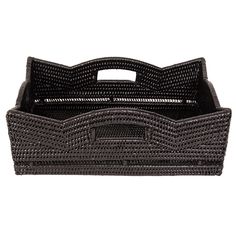 a black wicker basket with handles