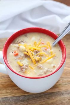 a bowl of soup with cheese on top