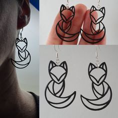 the earrings are designed to look like foxes