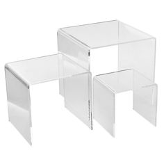 three acrylic tables are stacked on top of each other