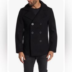 This Wool Blend Coat Features Classic Details For A Stylish Peacoat Look. Fit: This Style Fits True To Size. - Notch Collar - Long Sleeves - Front Double Breasted Closure - 2 Front Welt Pockets - Wool Blend Construction - Lined. Double-breasted Black Pea Coat For Business, Black Double-breasted Pea Coat For Business, Black Pea Coat With Double Button And Lapel Collar, Black Double-breasted Wool Peacoat, Black Wool Double-breasted Peacoat, Black Double Button Peacoat For Work, Modern Black Wool Coat With Double Button Closure, Black Pea Coat With Double Button Closure, Black Single Breasted Pea Coat For Cold Weather