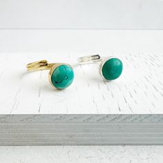 Elevate your look with our elegant adjustable ring, featuring an unique wrap-around band. · Turquoise / 10mm· Gold/Silver plated brass· Adjustable *Please note - Due to the one-of-a-kind nature of the stones, exact colors and patterns may vary slightly from the image shown. If you would prefer a specific look or color of the stone, please let us know! Turquoise Ring Gold, Ring Gold And Silver, Long Statement Earrings, Turquoise Gold Ring, Silver Wrap Ring, Gold Gemstone Ring, Wrap Ring, Ring Simple, Wrap Rings