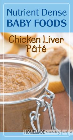 a close up of a jar of baby food on a table with bread in the background