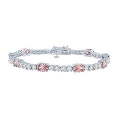 Adorn yourself with a personalized tennis bracelet like this chic sparkling style which features your birth month gemstone as part of the design. Crafted from Pure Silver Over Brass, this bracelet features an array of round and oval-cut gemstones with a box clasp closure. Features: Quick ShipCircumference: 7 1/2 InchSetting: ProngStone Cut: OvalStone Millimeter Measurement: 7 Mm Length, 5 Mm WidthMetal Color: WhiteCare: Wipe CleanStone Type: 8 Simulated Morganite, 40 Cubic ZirconiaAuthenticity: Bracelets Tennis, Month Gemstones, Pink Morganite, Box Clasp, Birth Month, Tennis Bracelet, Morganite, Pure Silver, Oval Cut