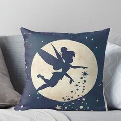 the silhouette of a fairy on a full moon with stars and sparkles throw pillow